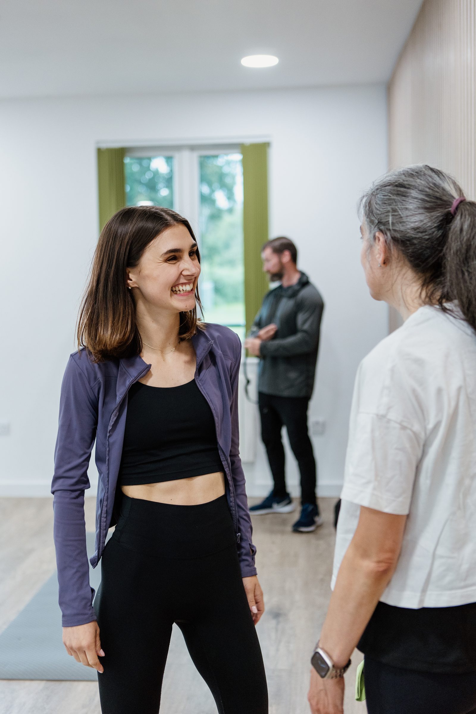 Jess sharing a laugh with one of her kettlebell class members